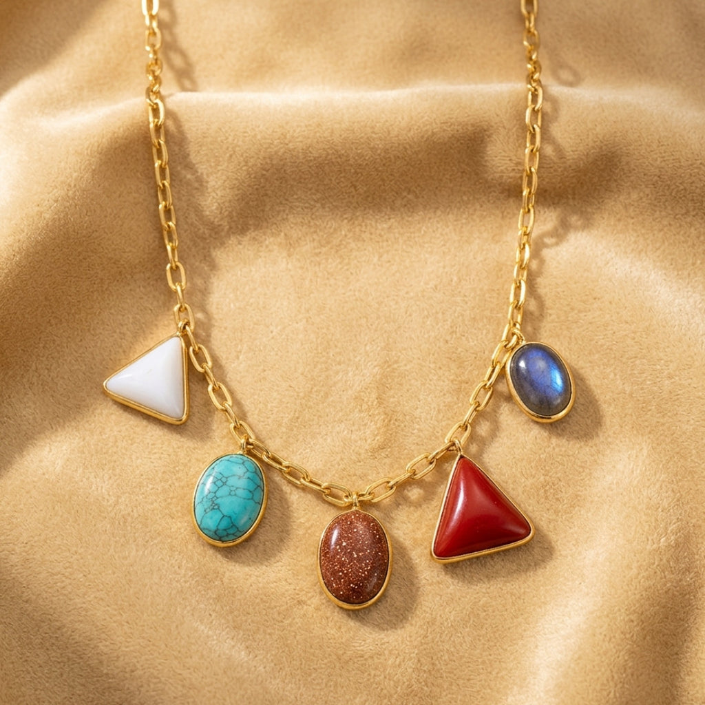 Gold-Tone Statement Necklace with Red Oval Stone and Multi-Color Dangle Accents