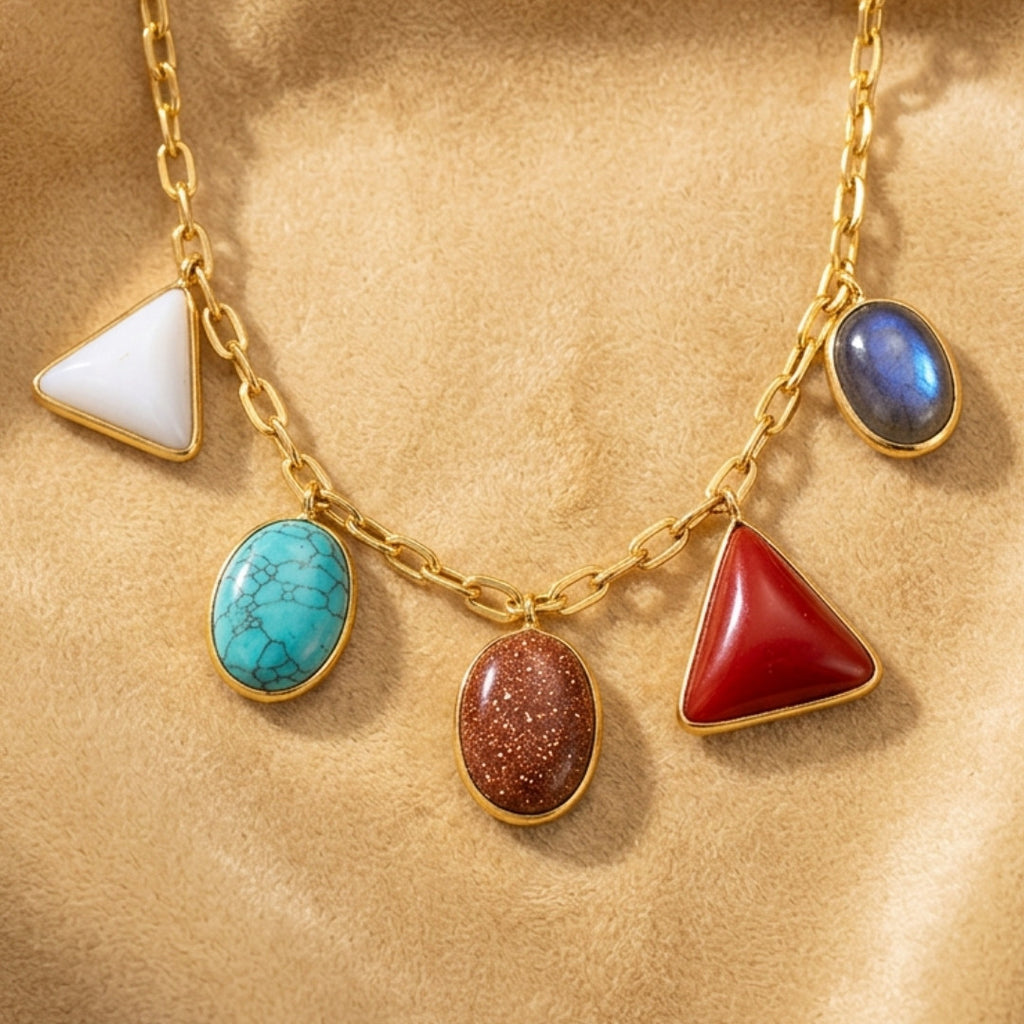 Gold-Tone Statement Necklace with Red Oval Stone and Multi-Color Dangle Accents