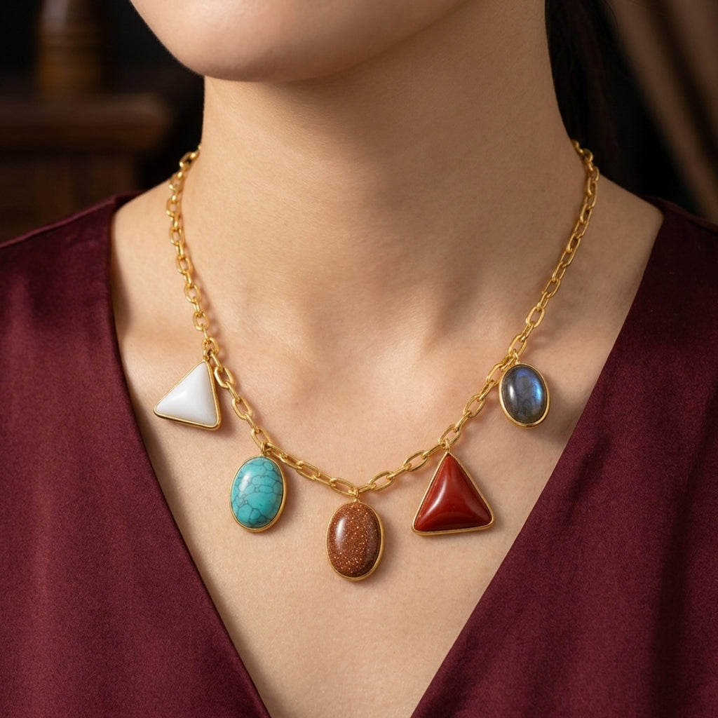 Gold-Tone Statement Necklace with Red Oval Stone and Multi-Color Dangle Accents