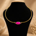Minimalist Gold-Tone Collar Necklace with Vibrant Pink Oval Stone