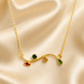 Whimsical Gold-Tone Branch Necklace with Multi-Color Gemstone Accents