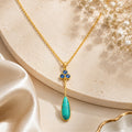 Gold-Tone Delicate Pendant Necklace with Blue Crystal Cluster and Turquoise Teardrop Stone