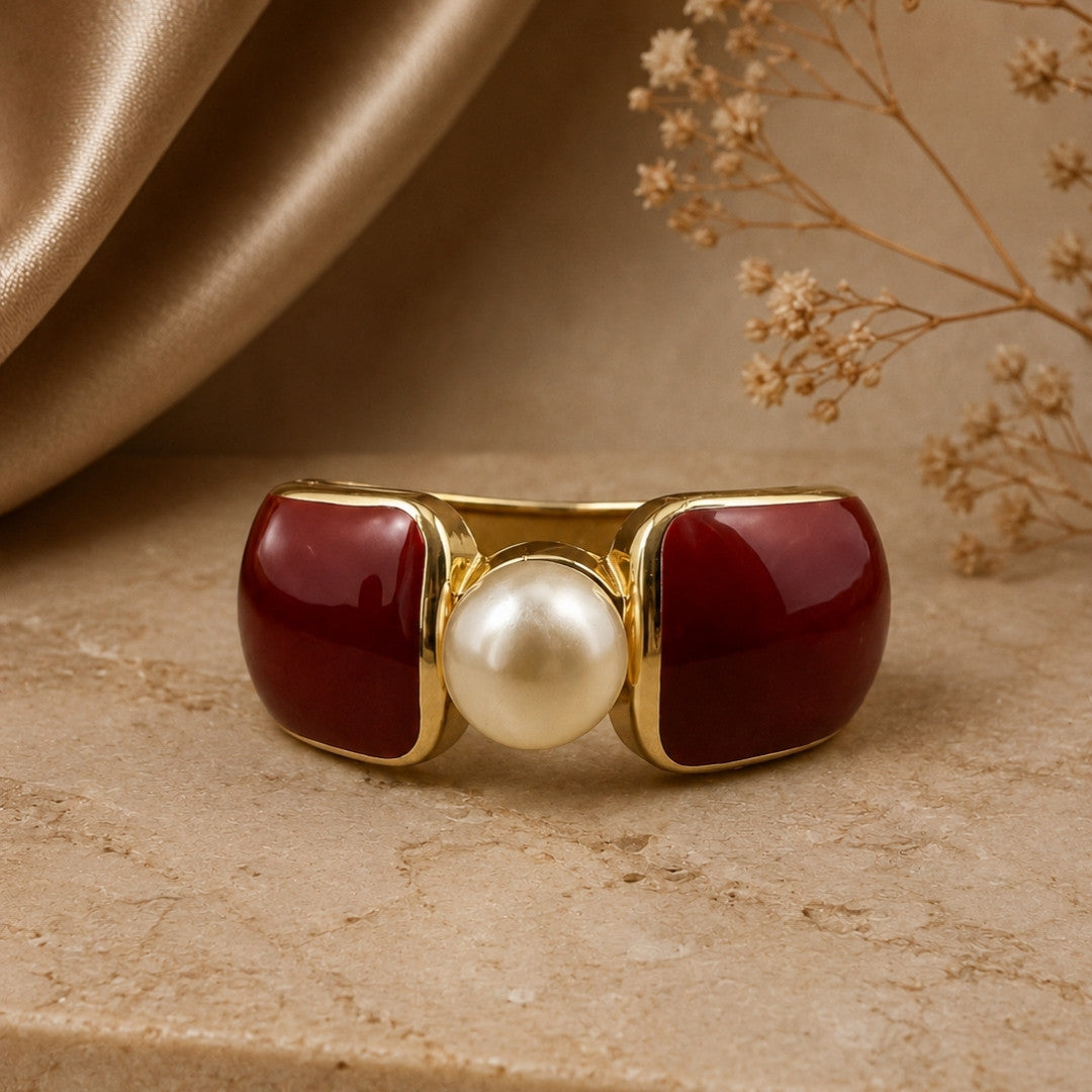Gold-Tone Statement Cuff Bracelet with Deep Red Accents and Central Pearl