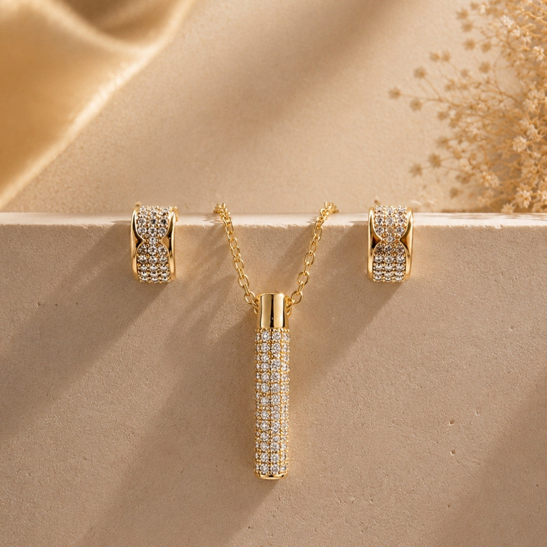 Golden Cylinder Pavé Crystal Jewelry Set – Luxe Pendant Necklace & Matching Hoop Earrings
