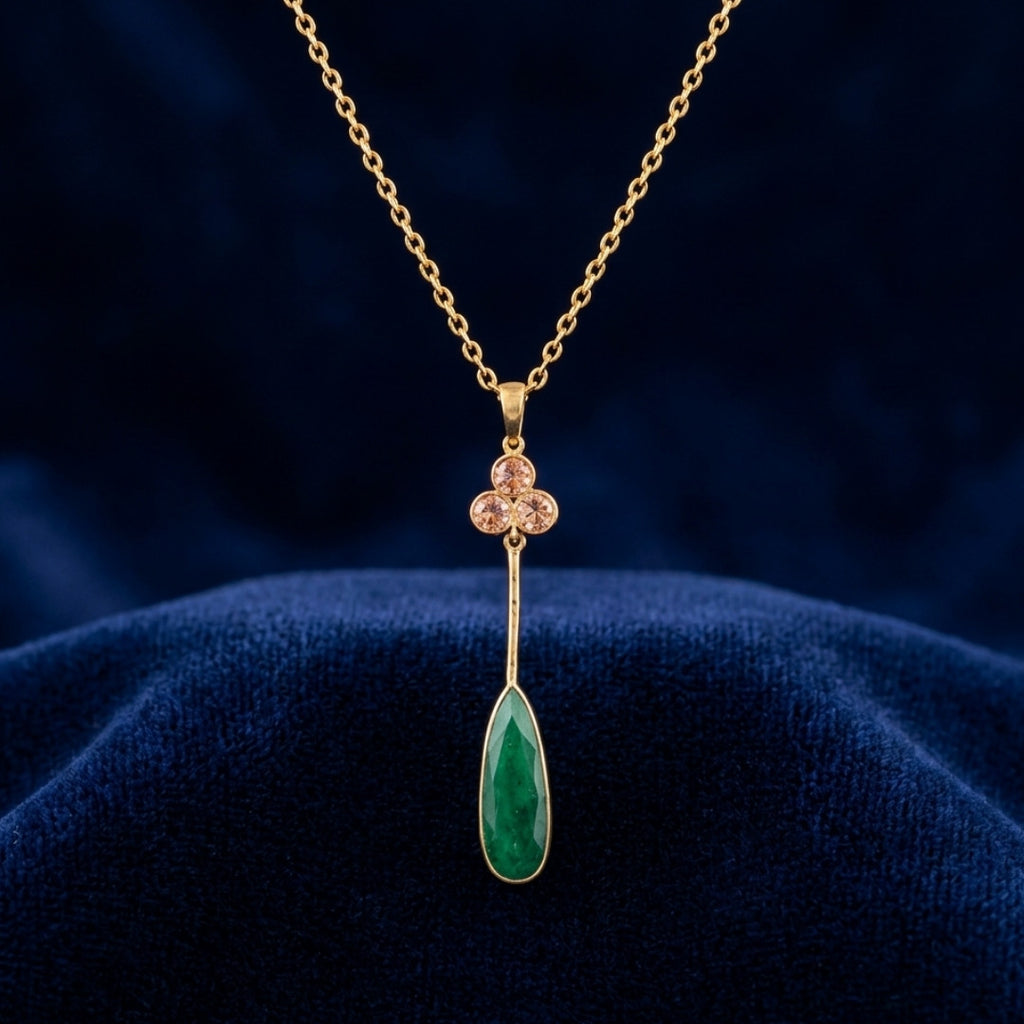 Emerald Teardrop Pendant Necklace with Delicate Floral Accent