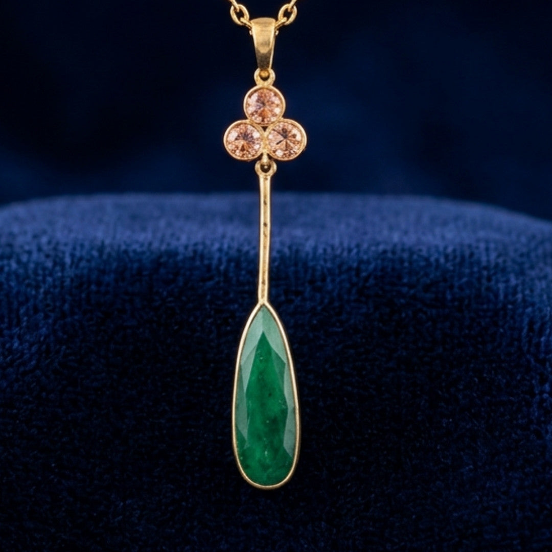 Emerald Teardrop Pendant Necklace with Delicate Floral Accent