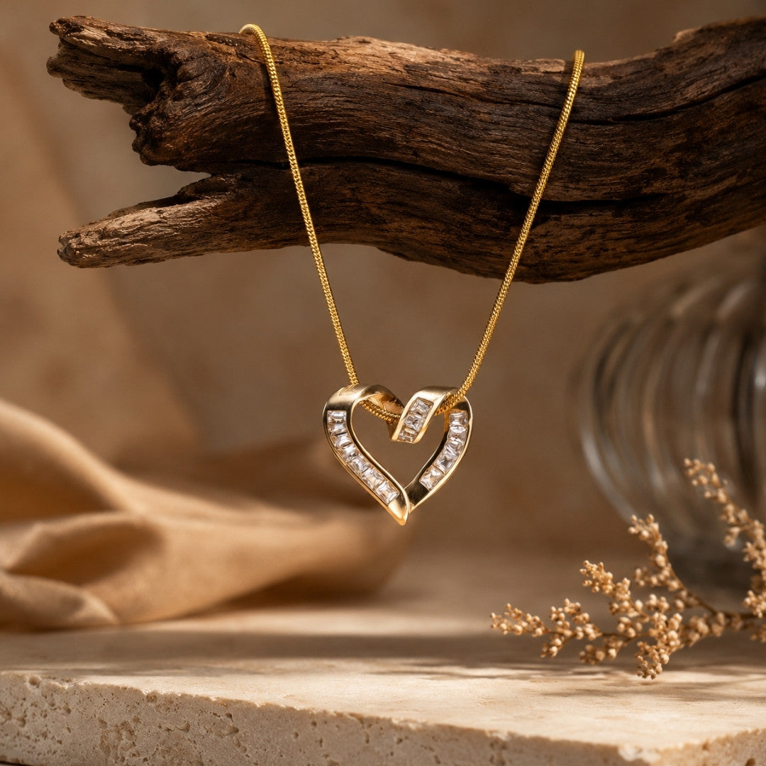 Interlocking Crystal Baguette Heart Pendant Necklace – Elegant Gold-Tone Rope Chain
