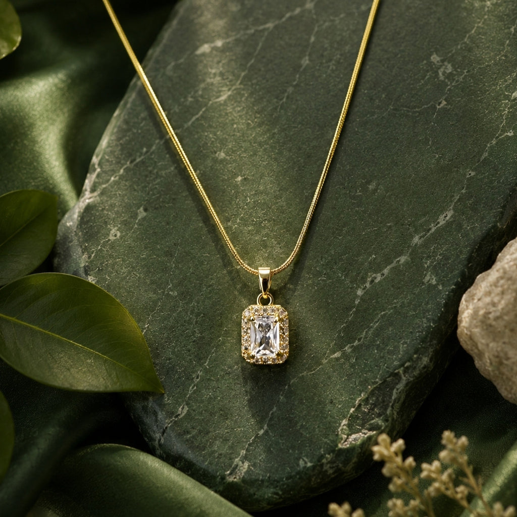 Emerald-Cut Crystal Halo Pendant Necklace – Timeless Gold-Tone Snake Chain
